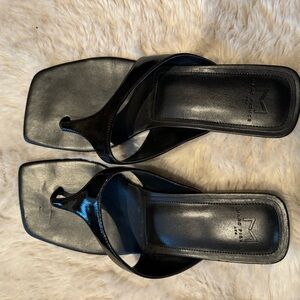 Black kitten heel sandal.  Can be dressy or casual.  LIKE NEW